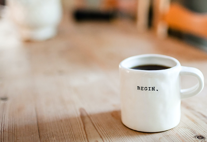 coffee cup labelled begin